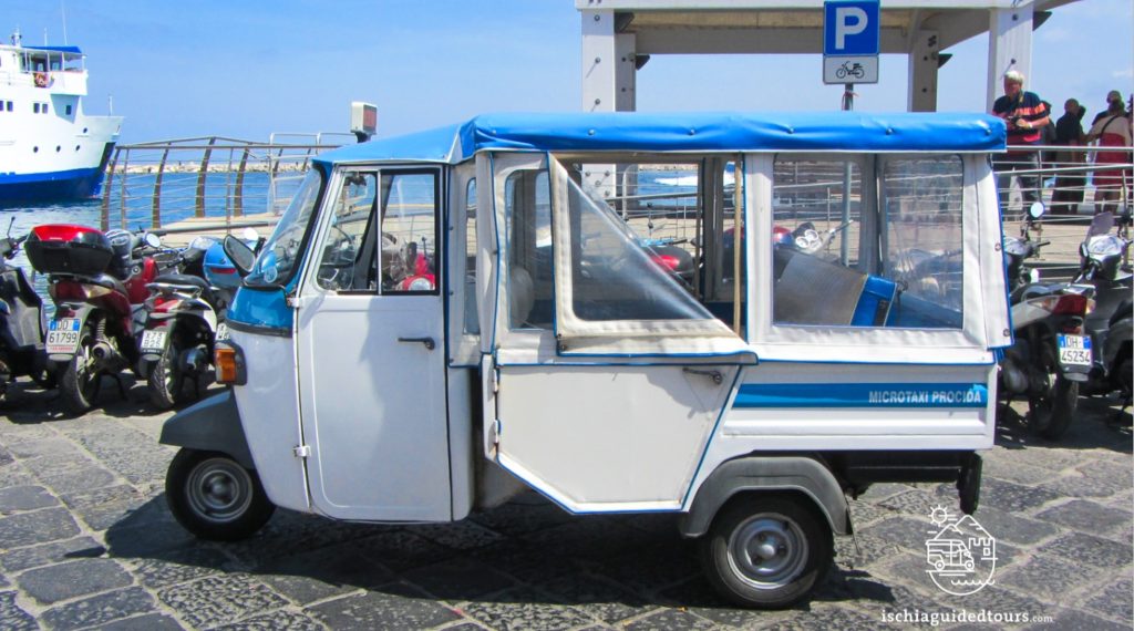 Micro taxi tour of Procida, Tuk tuk Procida, Procida tours, Procida apecar., Procida island, private tour of Procida, Ischia guided tour, Tuk tuk in Ischia, Apecar in Ischia, microtaxi in Ischia, piaggio tuk tuk, three-wheeler taxi, three wheelers, Ischia taxi, Ischia Ape, Ischia three wheeler, Ischia typical taxi, Capri, amalfi coast, calessino, Fiat, calessino ride, calessino tour in Ischia, Apecar tours, Tuk tuk in Ischia, Tuk Tuk in Procida, Sorrento calessino ride